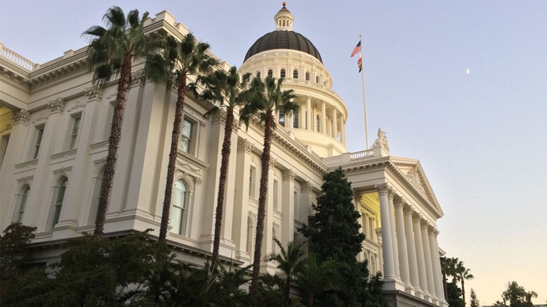 California State Capitol, lined by palm trees